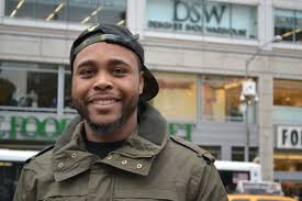 a man standing in front of a building